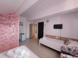 Postel nebo postele na pokoji v ubytování Casa Octaral