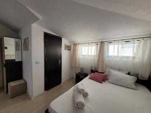 Postel nebo postele na pokoji v ubytování Casa Octaral