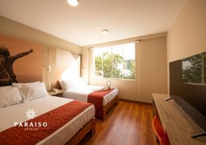 Cama o camas de una habitación en Hoteles Paraiso PIURA