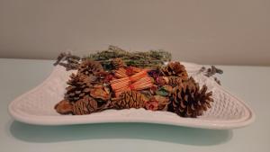 a plate of food with pine cones on it at Apartamento VILLASOLETE in Fuengirola