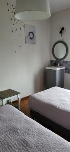 Ένα ή περισσότερα κρεβάτια σε δωμάτιο στο Chambres Esprit Campagne
