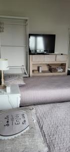 Μια τηλεόραση ή/και κέντρο ψυχαγωγίας στο Chambres Esprit Campagne