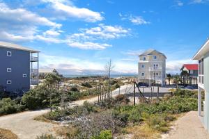 a view of the beach from a house at Havin A Blas by Pristine Properties Vacation Rentals in Cape San Blas