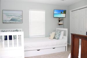 The Ricks Carlton by Pristine Properties Vacation Rentals房間的床