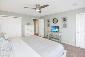 The Ricks Carlton by Pristine Properties Vacation Rentals房間的床