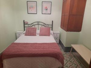 Ένα ή περισσότερα κρεβάτια σε δωμάτιο στο Villamillona