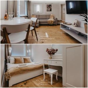 een woonkamer met een bed en een bureau bij Happy Gold - Happy Apartamenty Mielec in Mielec
