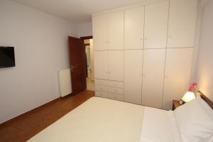 Postel nebo postele na pokoji v ubytování SPACIOUS COUNTRY APARTMENT