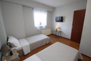 Postel nebo postele na pokoji v ubytování SPACIOUS COUNTRY APARTMENT