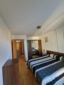 a hotel room with two beds in a room at Castro Urdiales Mioño in Mioño