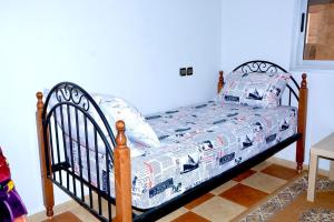 מיטה או מיטות בחדר ב-HN Home House with air conditioning