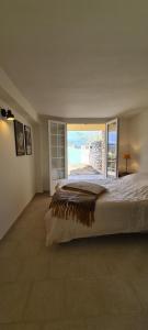 Katil atau katil-katil dalam bilik di La Villa Bellevue Anduze