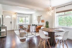 a living room with a table and chairs at Boho Inspired NOTL Wine Country Private Home for 2 in Niagara-on-the-Lake