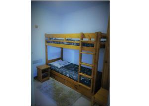 Una cama o camas cuchetas en una habitación  de Appartement 6 pers. coeur station 68995