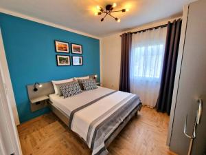 Posteľ alebo postele v izbe v ubytovaní Apartment Tome-3 by Interhome