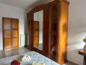 Ένα ή περισσότερα κρεβάτια σε δωμάτιο στο Casa Ivana