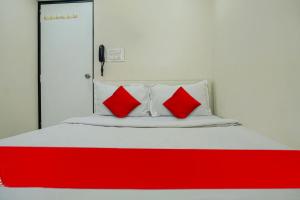 Postel nebo postele na pokoji v ubytování Hotel O B Happy Homely Stay