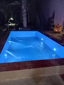 Bazén v ubytování Hotel Riad Sahara Activity nebo v jeho okolí