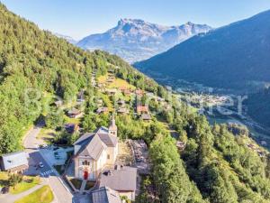 an aerial view of a small village in the mountains at Chalet Granier - Chalets pour 6 Personnes 34 in Saint-Gervais-les-Bains