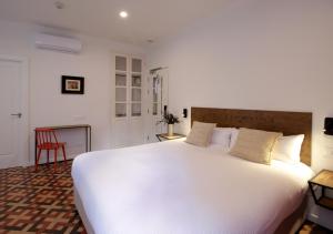 Postel nebo postele na pokoji v ubytování VALOLA Boutique Rooms