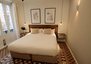 Postel nebo postele na pokoji v ubytování VALOLA Boutique Rooms