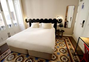 Postel nebo postele na pokoji v ubytování VALOLA Boutique Rooms