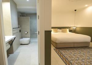Postel nebo postele na pokoji v ubytování VALOLA Boutique Rooms