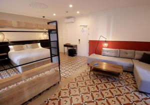 Postel nebo postele na pokoji v ubytování VALOLA Boutique Rooms