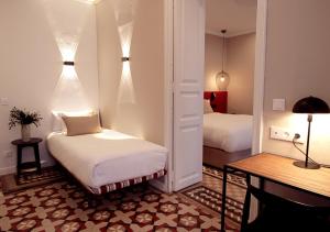Postel nebo postele na pokoji v ubytování VALOLA Boutique Rooms