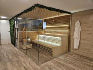 a room with a sauna with a glass wall at Villa Geronimo in Bansko +217 photos