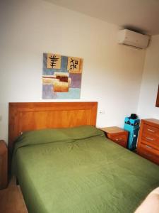 Postel nebo postele na pokoji v ubytování Apartamento familiar cerca playa con bandera azul