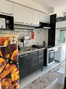Кухня или кухненски бокс в Apartamento Vida II - Super aconchegante!