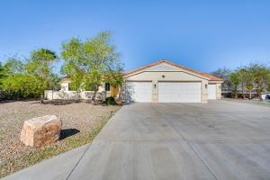 a house with a driveway with a garage at Inviting Home with Lake View 2 Mi to Lake Havasu! in Lake Havasu City