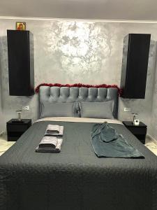 Un pat sau paturi într-o cameră la Palas Ultraconfort