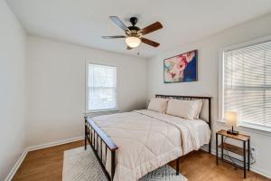 a bedroom with a bed and a ceiling fan at Cozy North Carolina Retreat Near Fishing and Boating in Washington