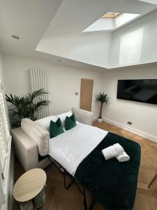 a living room with a bed and a couch at Apartment in Barnard Castle in Barnard Castle