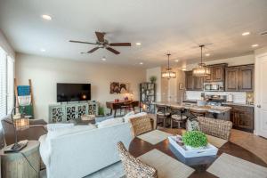 a living room with a couch and a table at Hoodoo Haute in St. George