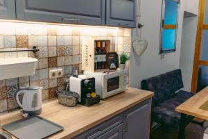 A kitchen or kitchenette at Bíborlak 7