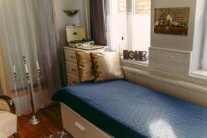 A bed or beds in a room at Bíborlak 7