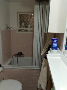 a bathroom with a tub and a toilet and a sink at Casa del Centro 2P in Santa Caterina Villarmosa +16 photos
