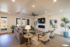 a living room with a couch and a table at Casa Ledges in Ivins
