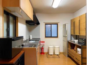 OiwakeにあるRental Villa Karuizawa Honors Hill - Vacation STAY 02336vのキッチン(シンク、カウンタートップ付)