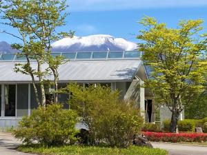 a building with a snow covered dome on top of it at Rental Villa Karuizawa Honors Hill - Vacation STAY 71491v in Oiwake