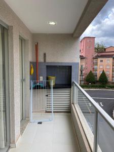 a balcony with a grill on the side of a building at Veredas do Rio Quente in Rio Quente