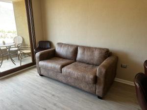 Posezení v ubytování Departamento en Ulriksen