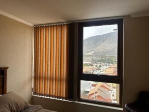 Nespecifikovaný výhled na hory nebo výhled na hory při pohledu z apartmánu + 3 fotografie