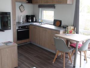 A kitchen or kitchenette at Holiday Home Toni by Interhome