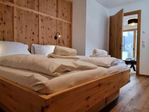 Postel nebo postele na pokoji v ubytování Apartment Home Dachsbau by Interhome