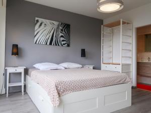 Кровать или кровати в номере Apartment Résidence Ciomal by Interhome