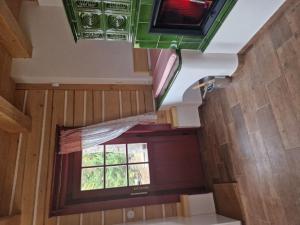 A television and/or entertainment centre at Holiday Home Roubenka Maleč by Interhome